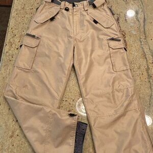 Snowboard/Ski pants lightly padded with plenty of pockets. Size S